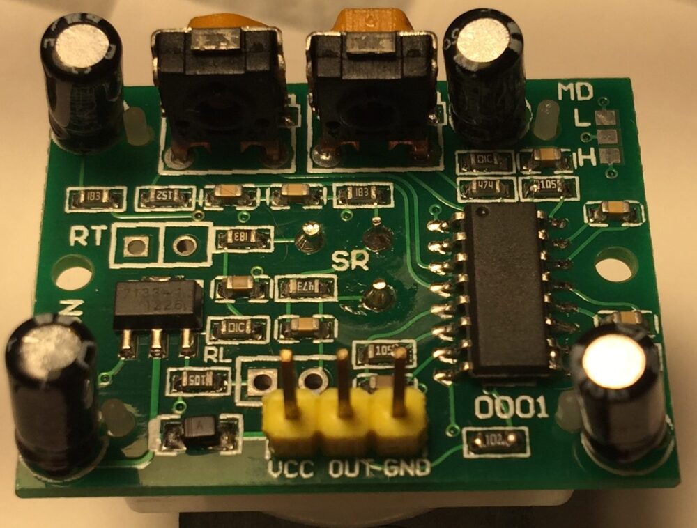 Connecting and uploading the code for the PIR motion sensor.